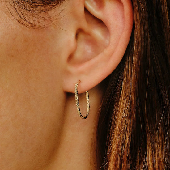 Métier 9k Engraved Gold Large Oval Clicker Hoop Earrings