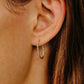 Métier 9k Engraved Gold Large Oval Clicker Hoop Earrings