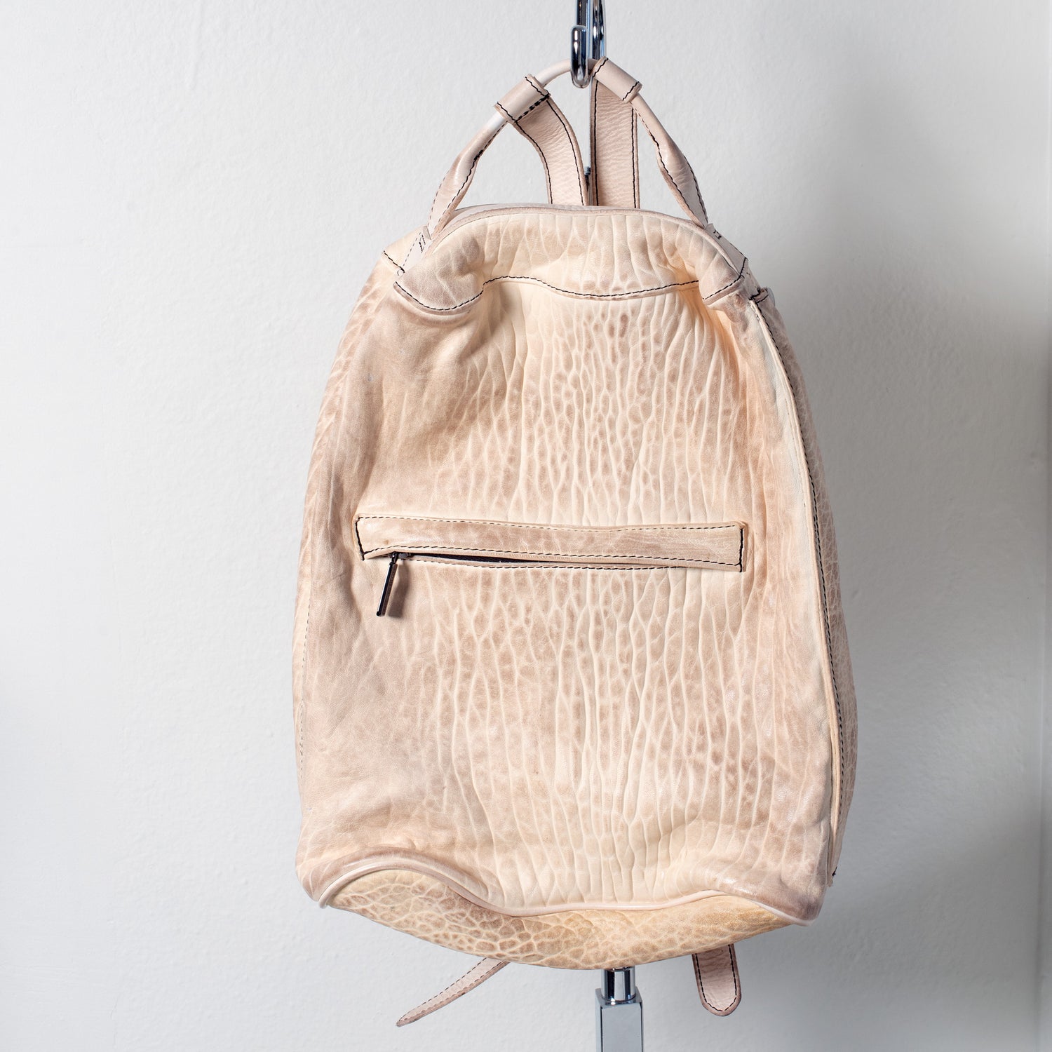 Numero 10 leather backpack for women in creamy vanilla tones. 