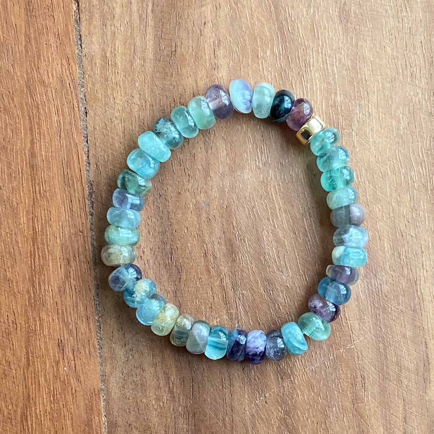 Stone Cache stretch gem stone bracelet in vibrant hues of fluorite blues and purples